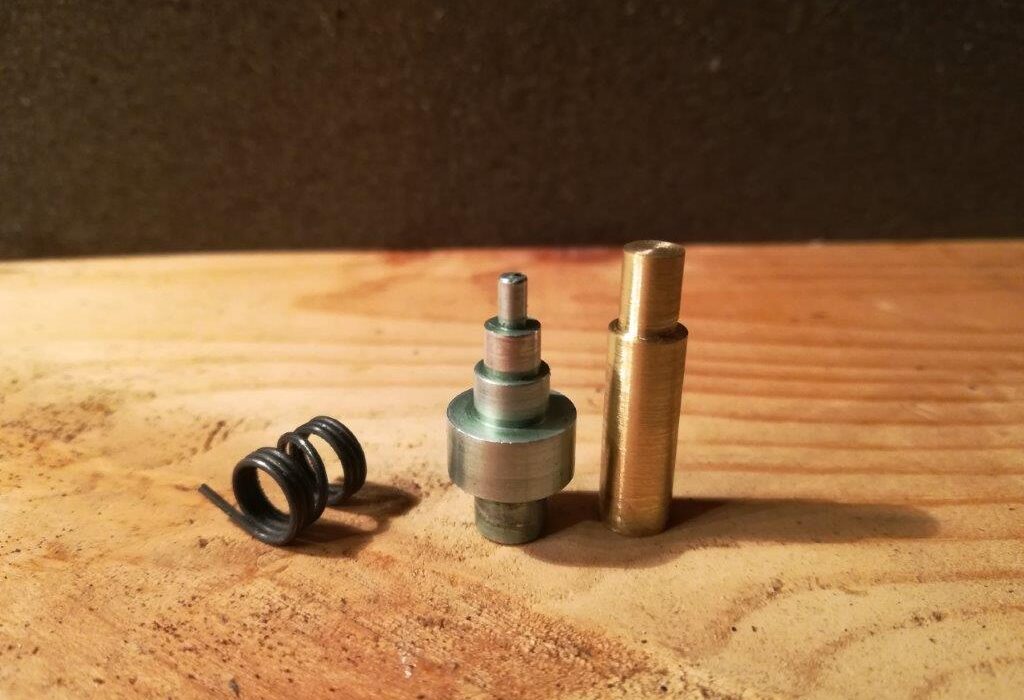 Original and replacement spindle